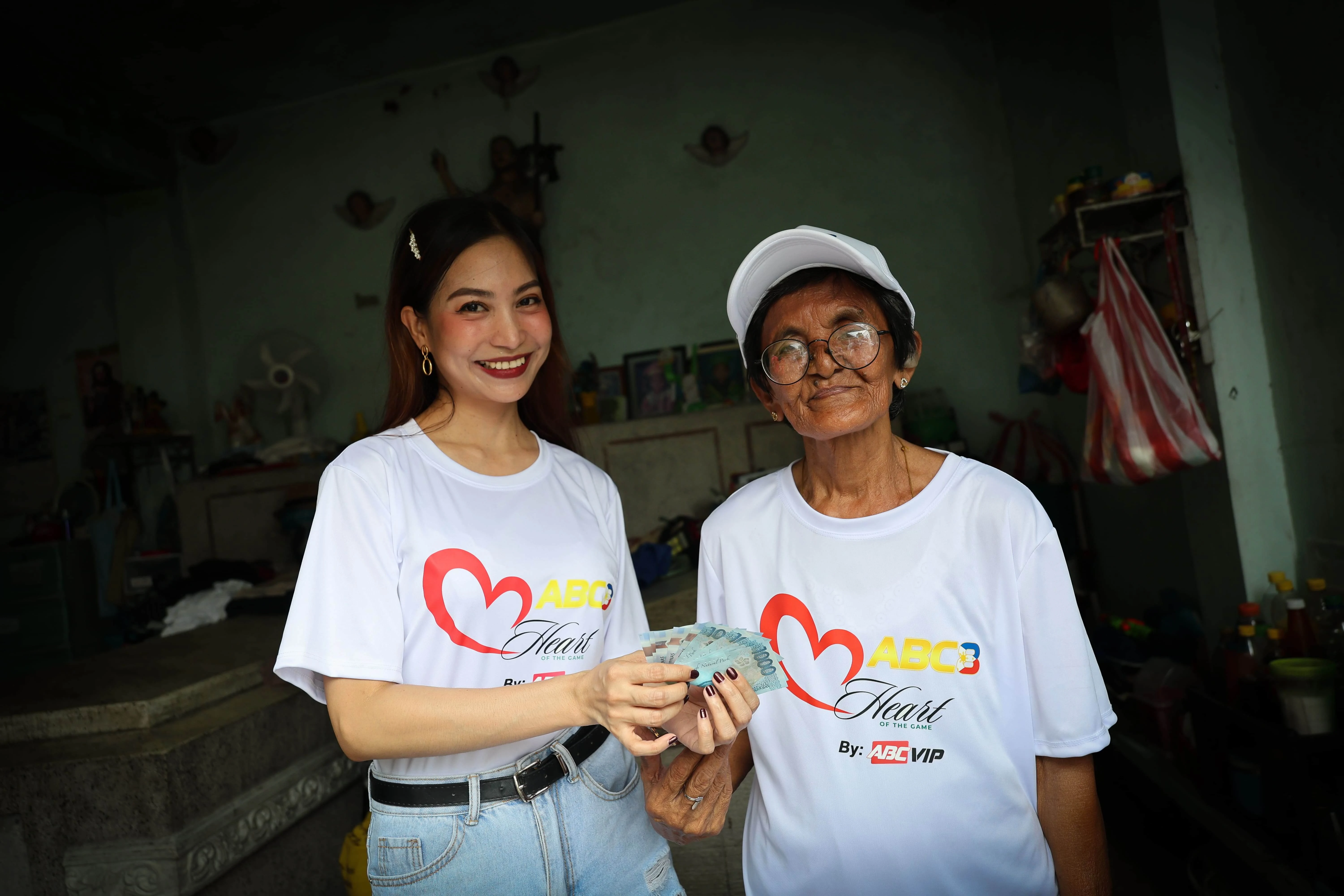 ABC8 charity team visit with Lola Raquel at Manila North Cemetery